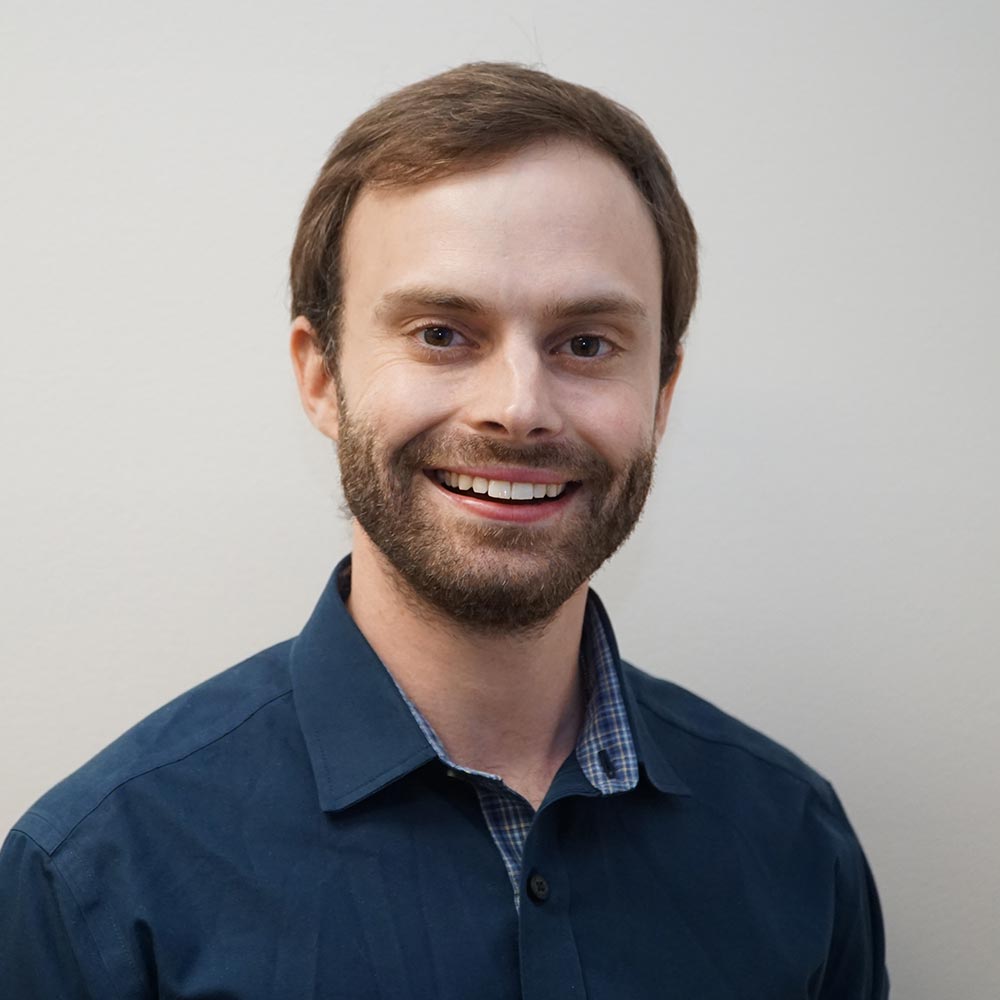 Headshot photo of Scottie Cabes
